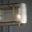 Anesty 4lt Linear Pendant light finished in Ant. Brass