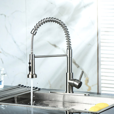 Stainless Steel Kitchen Faucet In Brushed Nickel Finish. Pull-Down Spray Head For Different Cleaning Demands. 360-Degree Swivel Spout Comprehensive Reach. Easy Installation With Provided Hardware. To