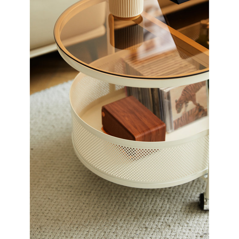 Table basse ovale blanche avec rangement combiné en métal et en verre - 35,56 po x 17,19 po x 17,19 po, verre trempé, cadre vaporisé, installation facile, stable, compartiment perforé, 4 roues rotatives pour