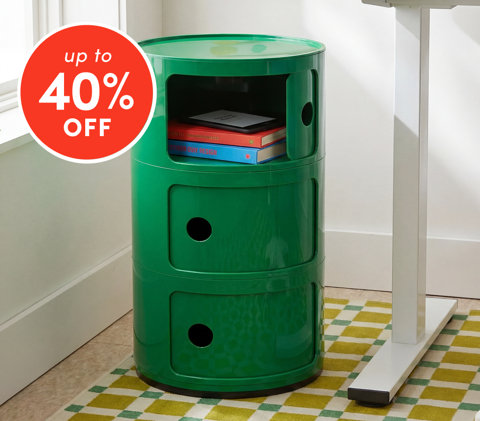 Desk storage up to 40% off featuring green cylindrical storage unit with books next to white desk