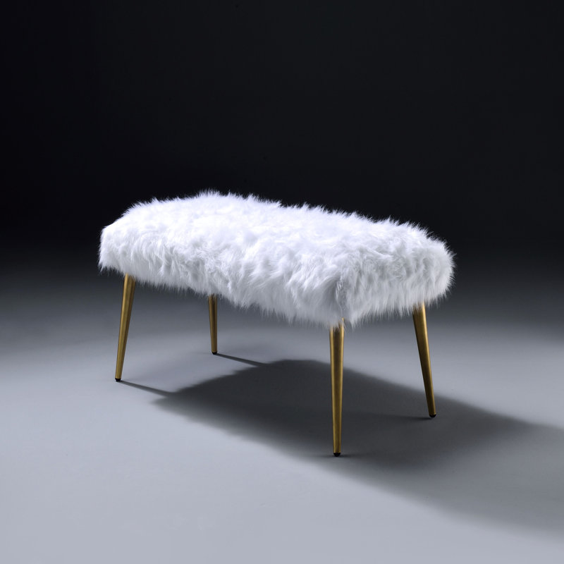 Fashionable Bedroom Bench With White Faux Fur Cover And Gleaming Gold Upholstered Attractive Legs -