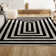 Tapis noir / ivoire Isibeal