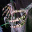 Faucheuse debout d'Halloween de 5,5 pieds avec bougie mobile et lumière DEL verte Haunted Hill Farm