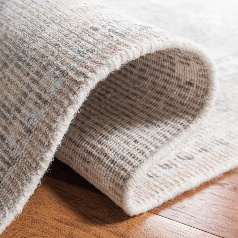 Beige and Sand 9' x 12' Hand-Tufted Wool and Viscose Rug