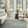 Tapis bleu abstrait en polyester Herickson