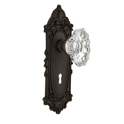 Plaque victorienne avec trou de serrure décoratif et poignée de porte de château