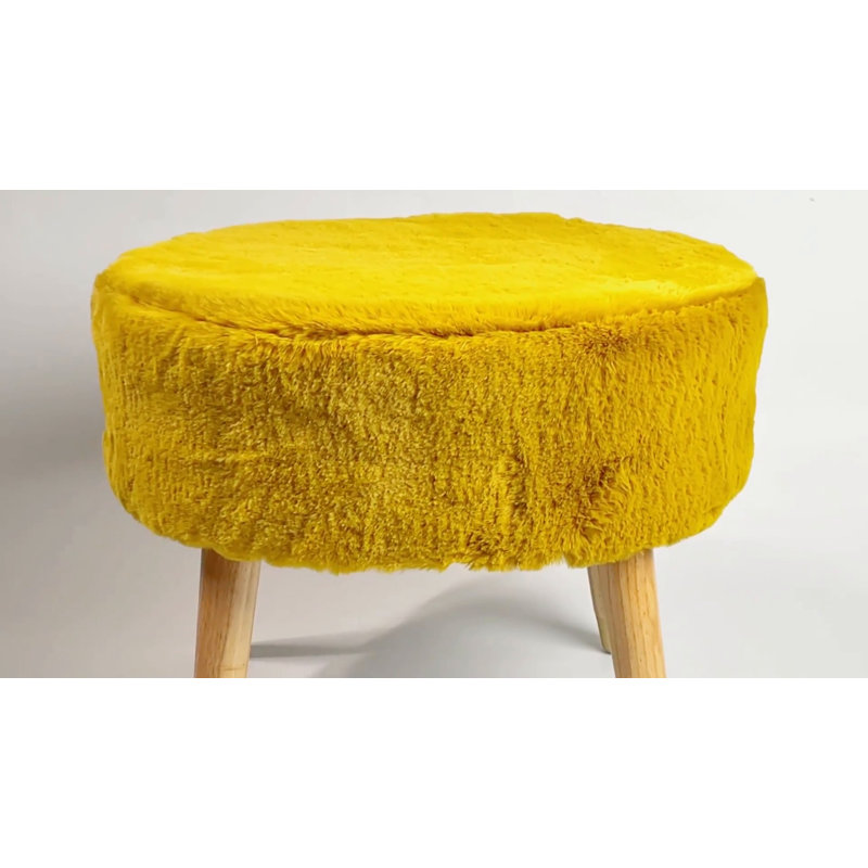 Black Faux Fur Oval Ottoman with Wooden Legs