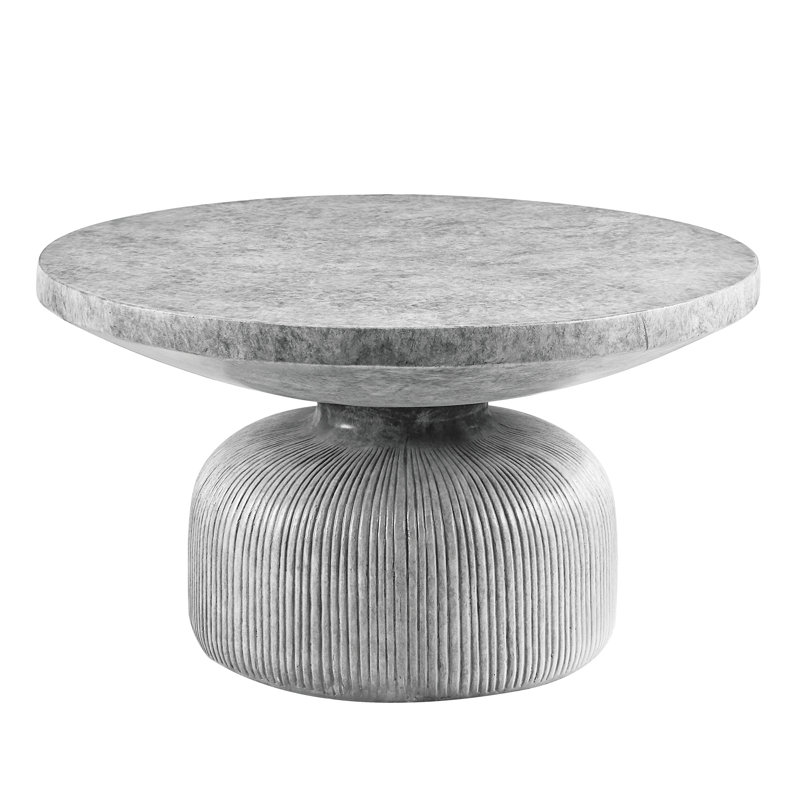 Table basse en ciment exquise avec surface ronde grise patinée et base de piédestal