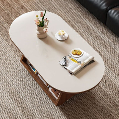 Table basse ovale en bois blanc et bois manufacturé