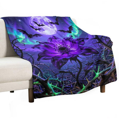 Jeté en flanelle mauve à motif de fleurs mauves, couverture douce et chaude pour le canapé-lit du salon