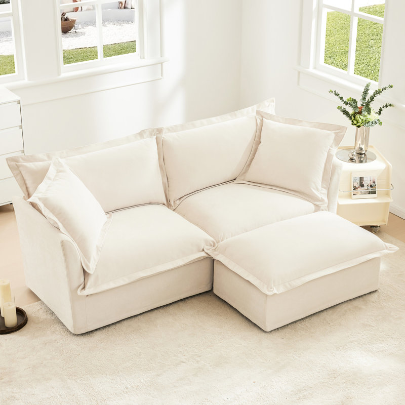 Canapé 2 places crème avec plusieurs coussins moelleux et tissu chenille convertible 2 pièces