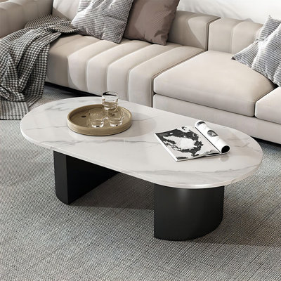 Table basse ovale en fer fritté blanc et noir