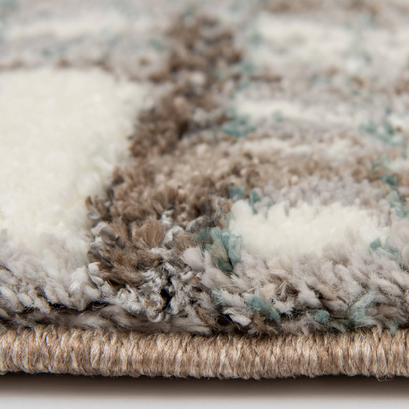 Tapis intérieur en polypropylène / polyester à motif écossais brun / multicolore Orren Ellis Courson Zanetta