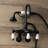 Kingston Brass Aqua Vintage Three-Handle 2-Hole Tub Wall Mount Clawfoot Tub Faucet with Hand Shower