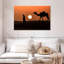 Silhouette d'homme et de chameau-690565900