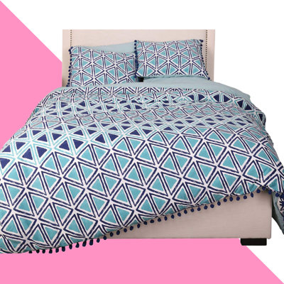Ensemble de housse de couette réversible en satin de coton avec garniture à pompons 