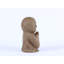 Statue Jizo japonais heureux et priant