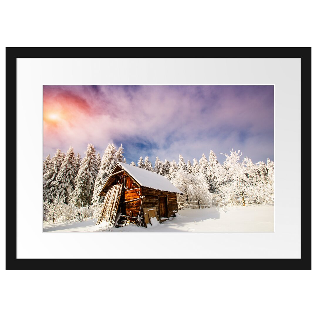 Gerahmtes Poster Holzhütte im Schnee