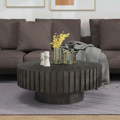 Table basse ronde noire au design minimaliste et moderne, avec texture bois naturel, montage facile, idéale pour le salon et la salle à manger.