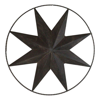 Décoration murale circulaire en métal bronze de 45,7 cm de diamètre, représentant une étoile à 8 branches de style western rustique vintage.