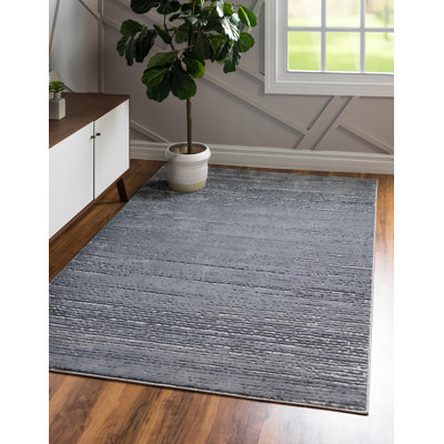 Tapis contemporain Araceli de couleur grise