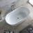 Dowell 60" Oval Solid Surface Freestanding Soaking Bathtub in Matte White