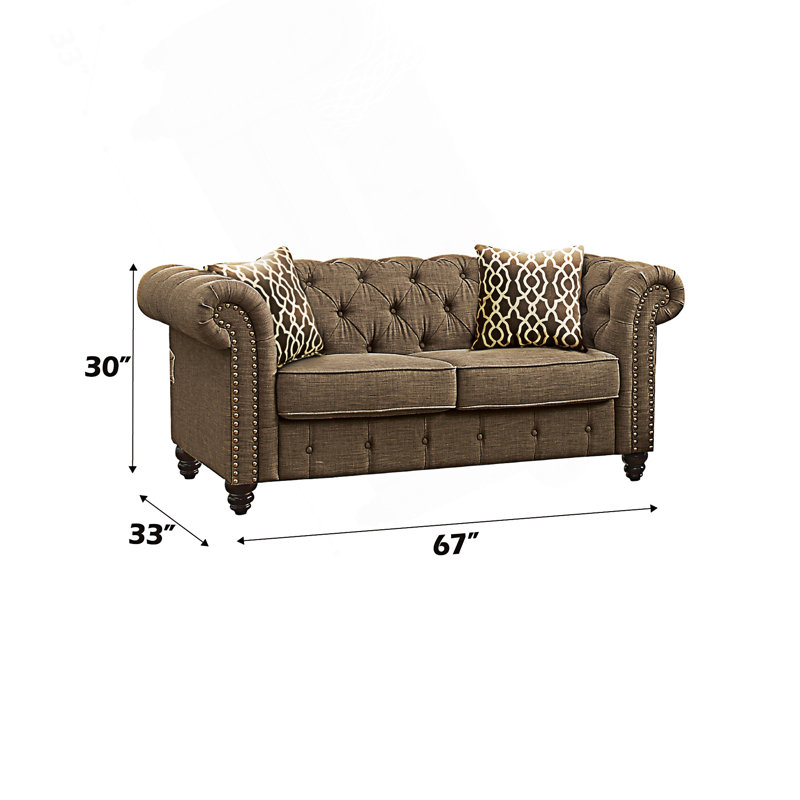 Chesterfield Style Loveseat With Two Accent Pillows
