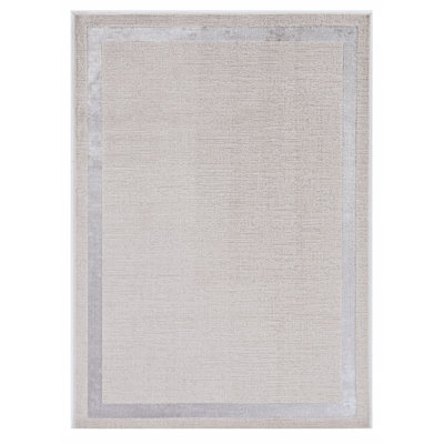 Tapis géométrique beige touffeté