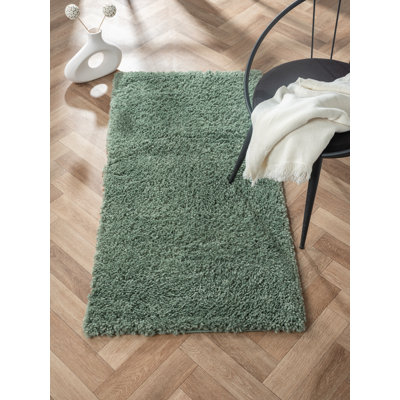 Lush shaggy carpet in  green