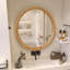 Miroir mural rond en bois naturel