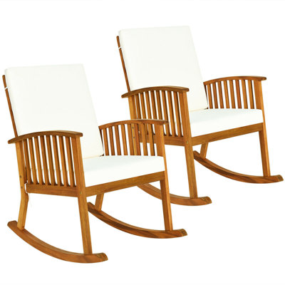 Chaise berçante d'extérieur en bois massif avec coussins