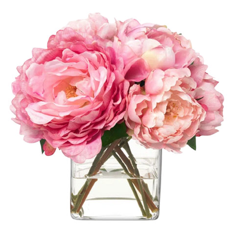 Pink peonies in a glass vase.