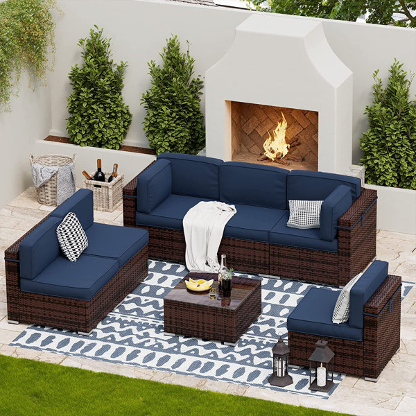 Azoriah Wicker 7 - Person Oversized Armrest Outdoor Seating Group with Storage Latitude Run Cushion Color: Navy Blue