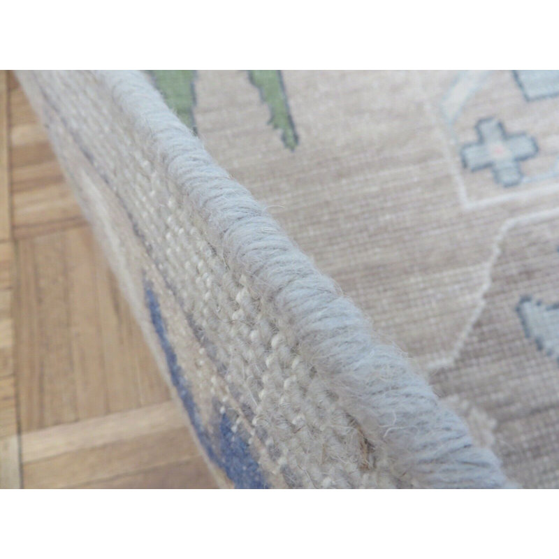 Tapis unique gris de 10 pi x 13 pi 9 po