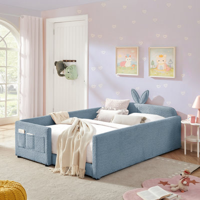 Lit plateforme tapissier avec tête de lit en forme d'oreille de lapin