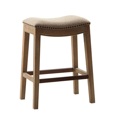 Tabouret de comptoir exaltant avec siège en mousse et détails en cuivre
