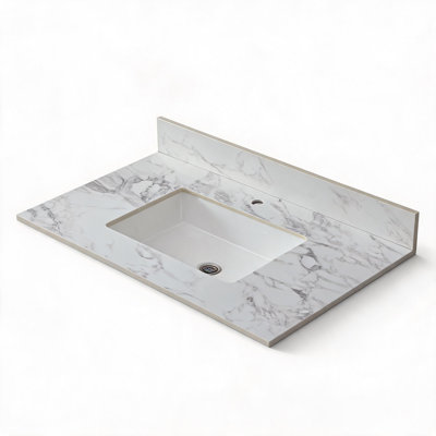 Plan de toilette en pierre frittée blanche de 94 cm x 56 cm avec lavabo rectangulaire encastré en céramique et dosseret.