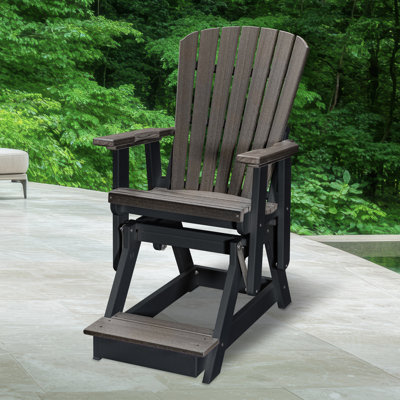 Fauteuil oscillant sur une base
