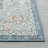 4' X 6' Blue And Ivory Floral Area Rug With UV Protection