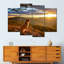 Chien regardant un lever de soleil sur toile 4 pièces-931824284