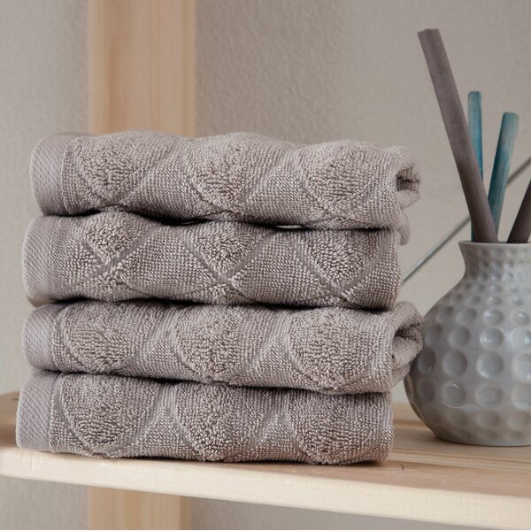 https://assets.wfcdn.com/im/72981965/resize-h600-w600%5Ecompr-r85/1071/107188355/Ozgur+4+Piece+Turkish+Cotton+Washcloth+Towel+Set.jpg