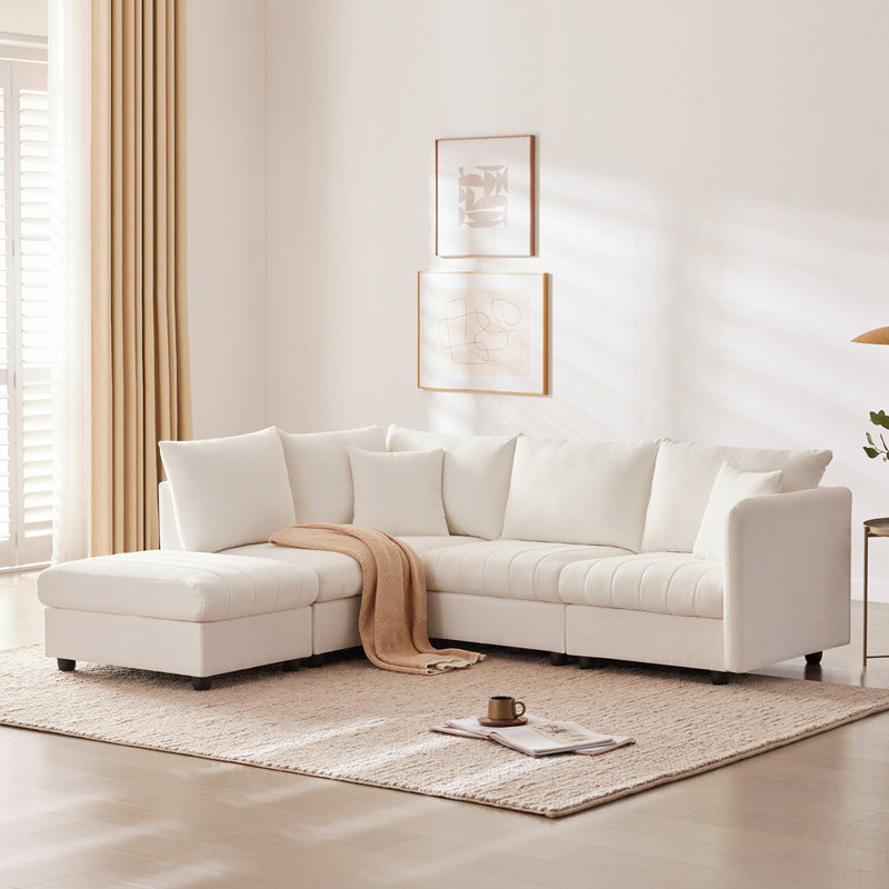 Canapé modulaire moderne avec assise profonde, rayures verticales et repose-pieds mobile pour un salon confortable, Blanc