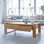 Nasrine Solid Wood Sled Coffee Table