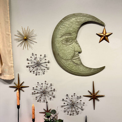 Rustic celestial metal crescent moon wall art in weathered verdigris green with golden star dangler — 25'' H x 23.75'' W x 0.5'' D