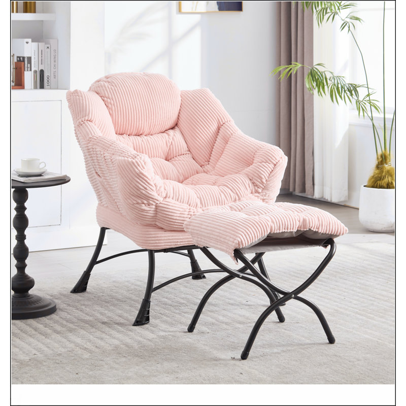 Méridienne moderne avec repose-pieds, accoudoirs et poche latérale pour une lecture confortable et une détente dans les petits espaces