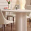 Table et chaises de salle à manger ovales de style crème-105858662