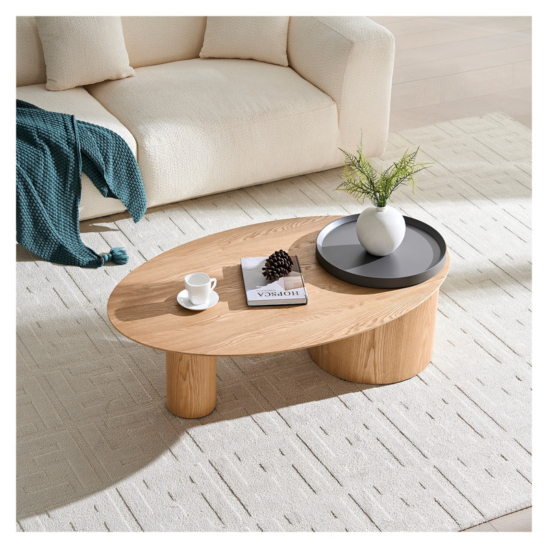 Table basse moderne ovale avec finition en bois aggloméré naturel pour le salon