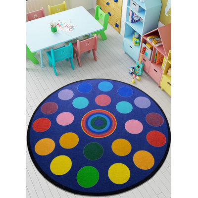 Tapis rond en polyamide touffeté à la machine bleu / jaune / rouge Ashcraft