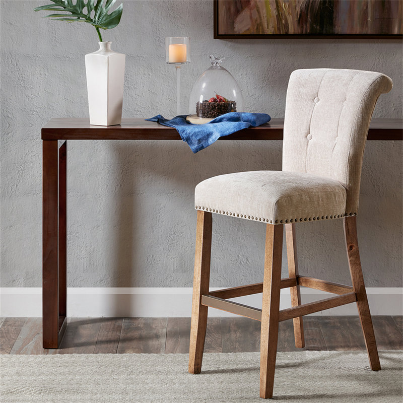 Tabouret de bar capitonné à boutons et têtes de clous