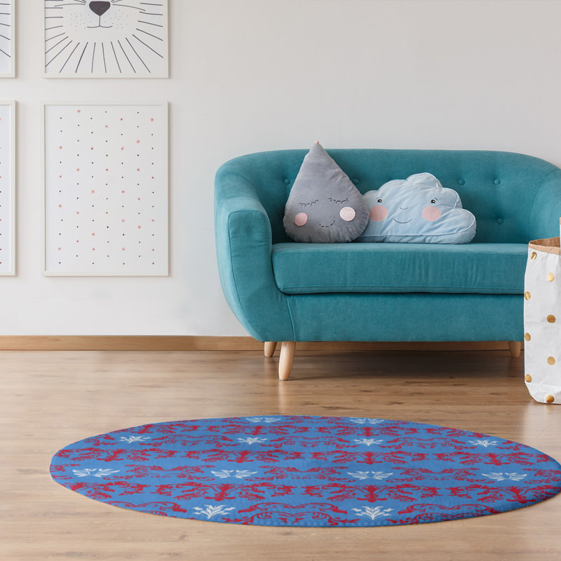 Tapis rond bleu damassé à motif baroque